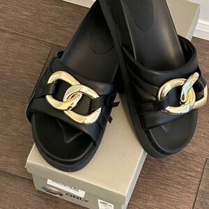 Brand new ONLY black and gold slides
